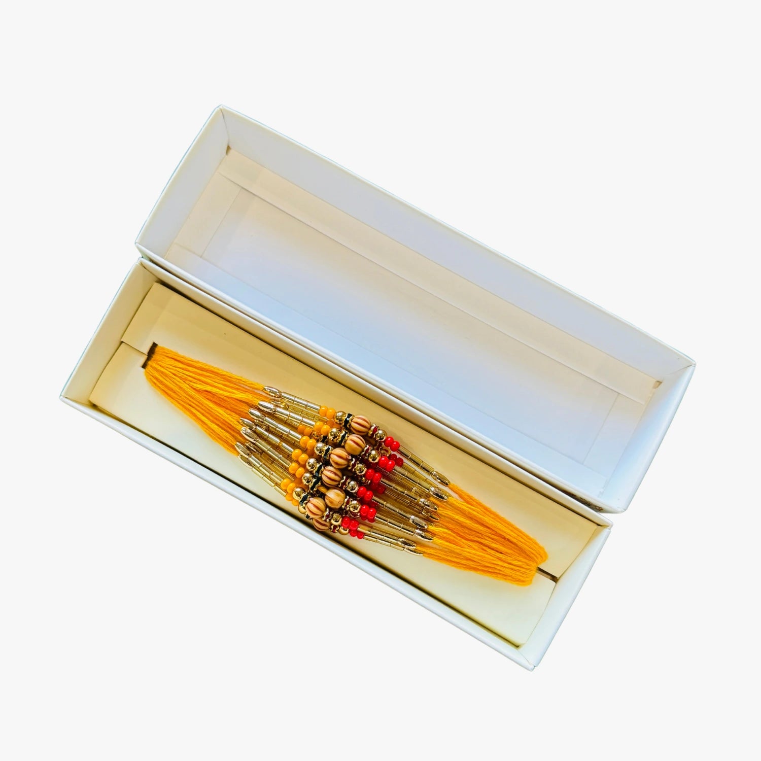 rown Centre Stone Rakhi Yellow
