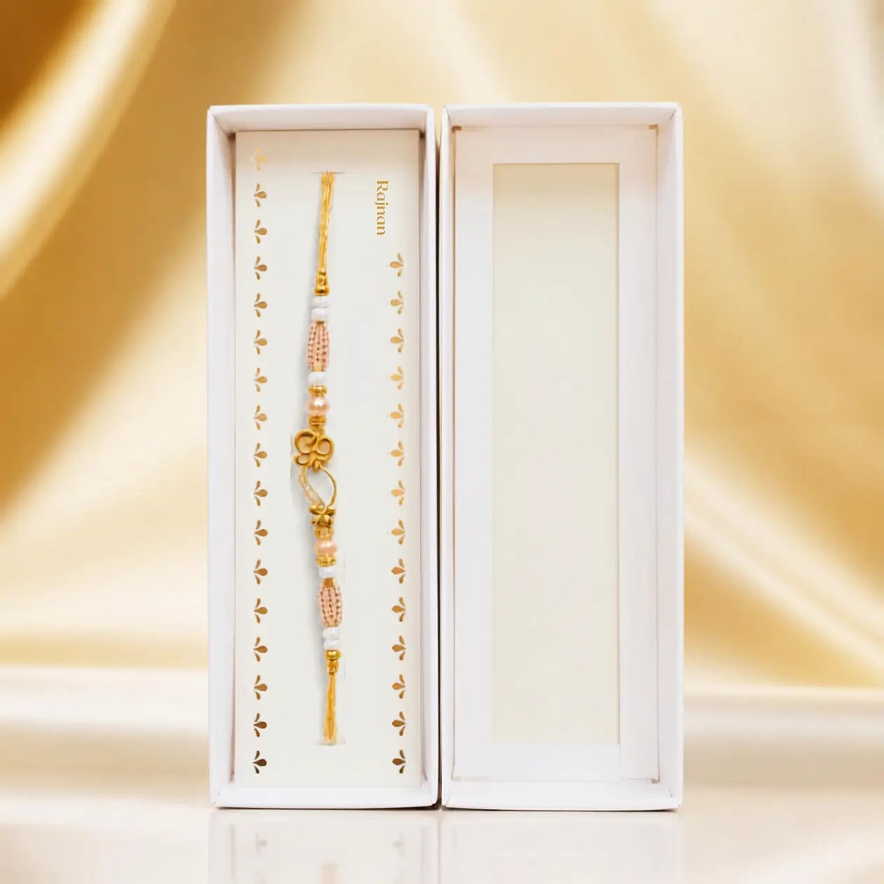 Golden Om Pearl Rakhi