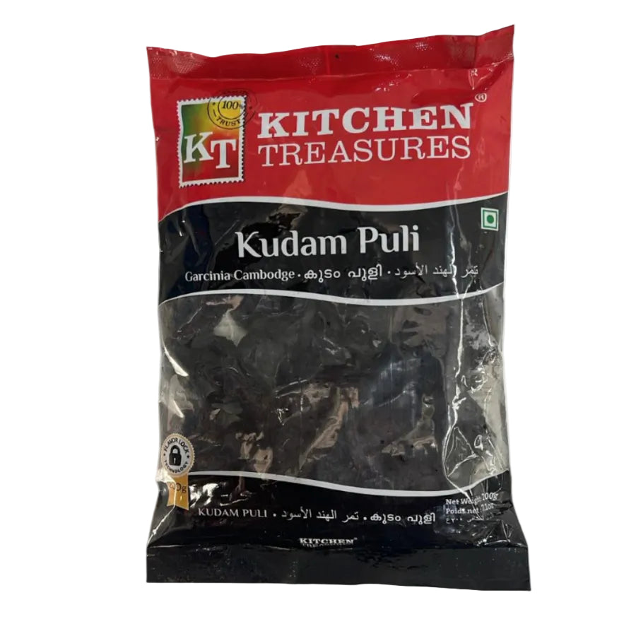 A packaged product labeled 'KITCHEN TREASURES Kudam Puli' in a transparent plastic bag showing the contents inside.
