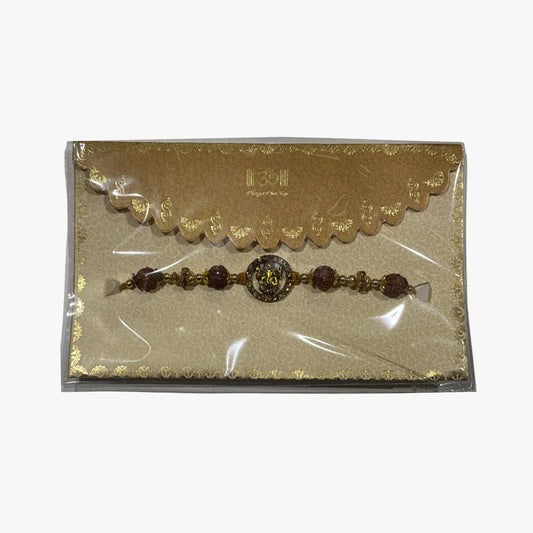 Spiritual Ganesh Rudraksha Gold Rakhi